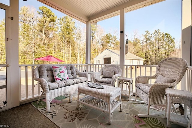 sunroom / solarium featuring a wealth of natural light