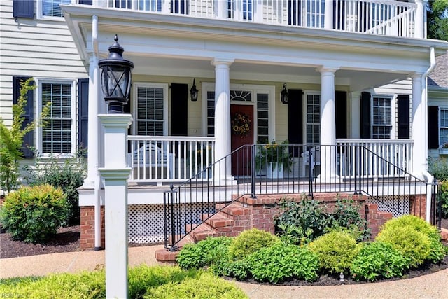 doorway to property featuring a porch