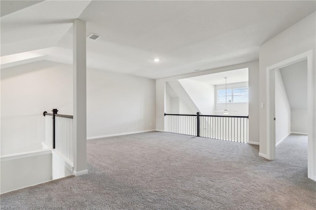 carpeted spare room featuring a ceiling fan, recessed lighting, visible vents, and baseboards