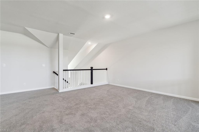 bonus room with lofted ceiling, recessed lighting, carpet flooring, visible vents, and baseboards