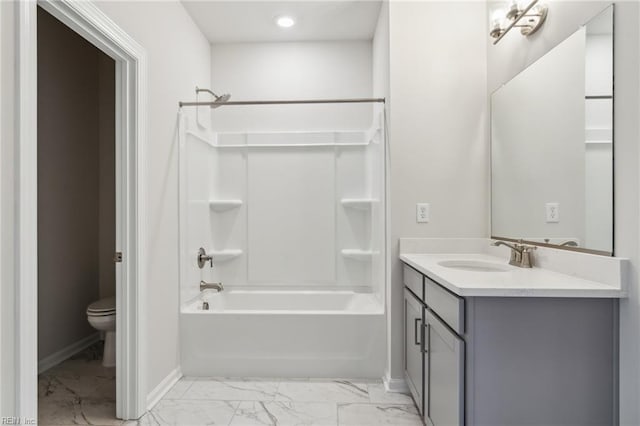 bathroom featuring baseboards, toilet, shower / tub combination, marble finish floor, and vanity