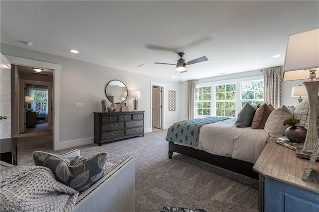 carpeted bedroom featuring baseboards, recessed lighting, and a ceiling fan