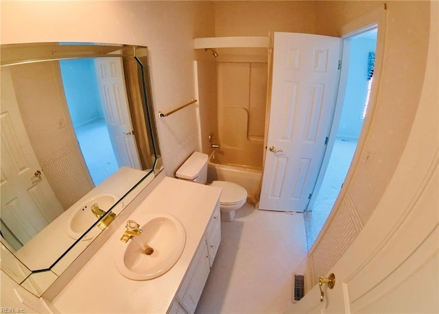 bathroom featuring washtub / shower combination, visible vents, vanity, and toilet