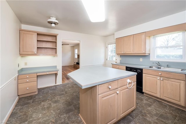 kitchen featuring light brown cabinets, dishwasher, open shelves, and a sink