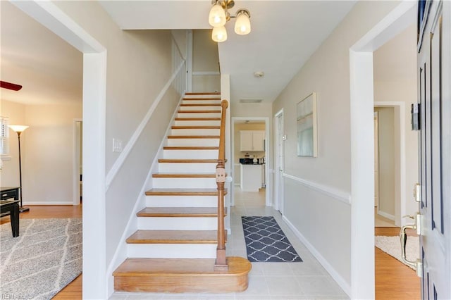 staircase with baseboards