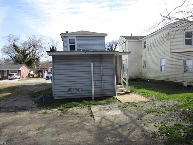 back of property with entry steps