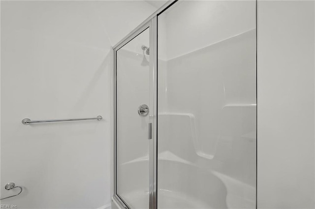 bathroom featuring a stall shower