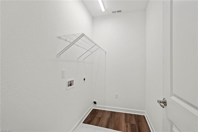 washroom featuring laundry area, visible vents, dark wood finished floors, hookup for a washing machine, and electric dryer hookup