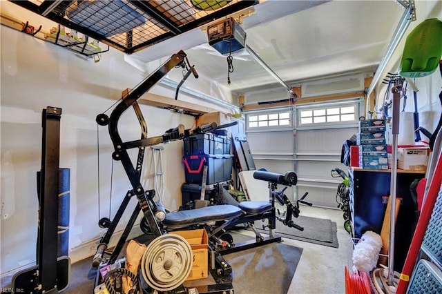 workout area with a garage