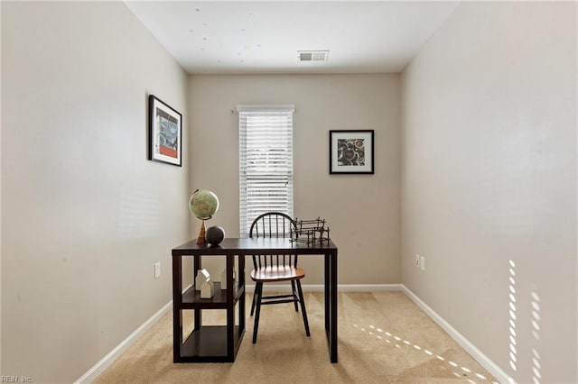 office with light carpet, baseboards, and visible vents