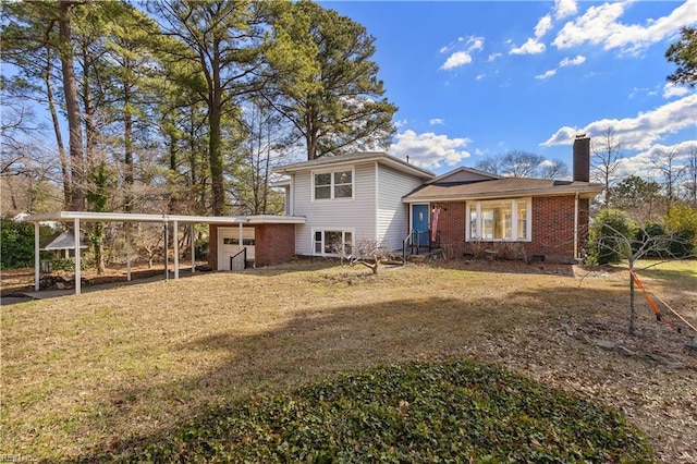 back of house with crawl space, brick siding, a chimney, and a lawn