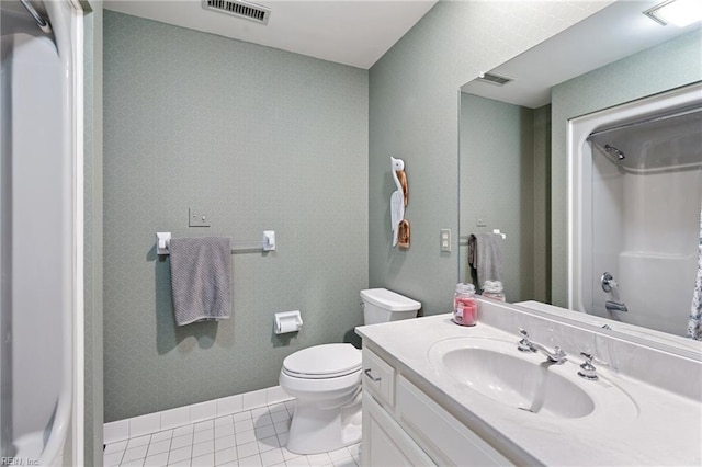 bathroom featuring tile patterned floors, visible vents, toilet, baseboards, and walk in shower