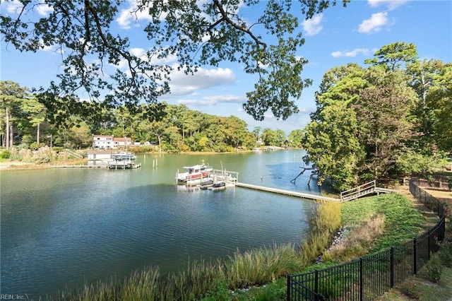 property view of water featuring a boat dock