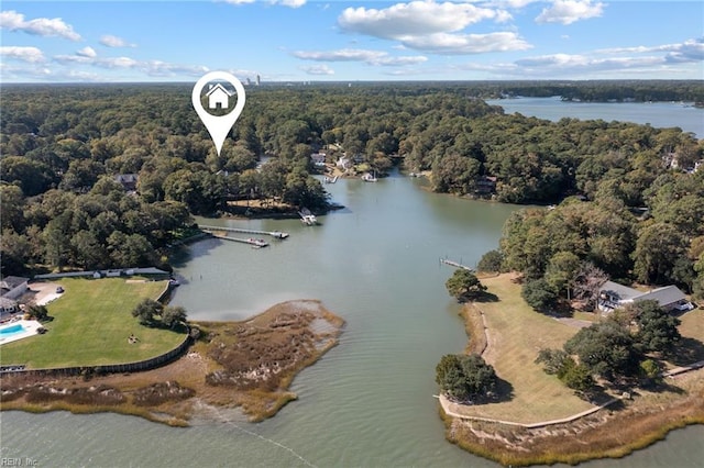 aerial view featuring a water view and a forest view