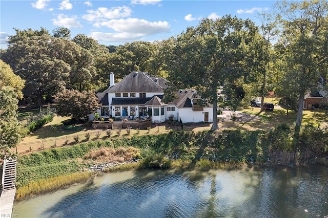 drone / aerial view with a water view