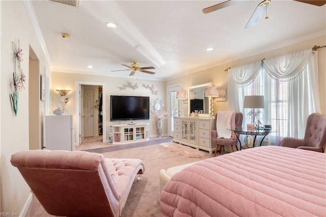 carpeted bedroom featuring ceiling fan, baseboards, crown molding, and recessed lighting