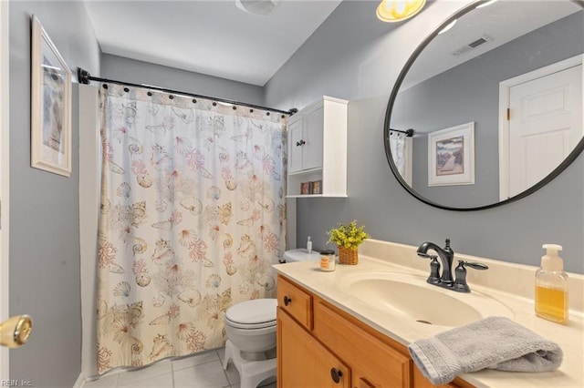 full bathroom featuring curtained shower, visible vents, toilet, vanity, and tile patterned floors