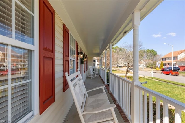 view of patio with a porch and a residential view