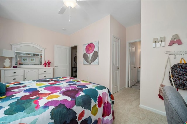 bedroom featuring a ceiling fan, light carpet, and baseboards