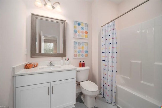 full bathroom featuring shower / tub combo, vanity, and toilet