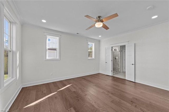 empty room featuring ceiling fan, recessed lighting, wood finished floors, baseboards, and ornamental molding