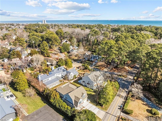 drone / aerial view featuring a water view and a residential view