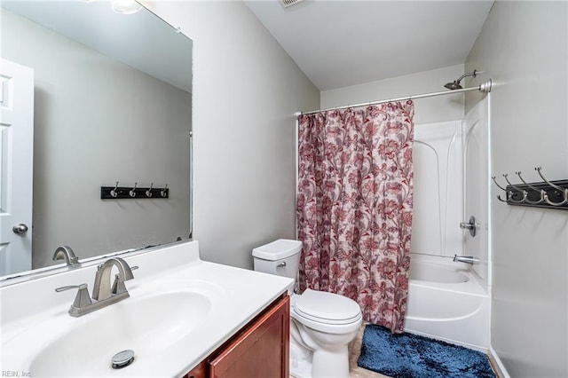 bathroom featuring visible vents, shower / tub combo with curtain, vanity, and toilet