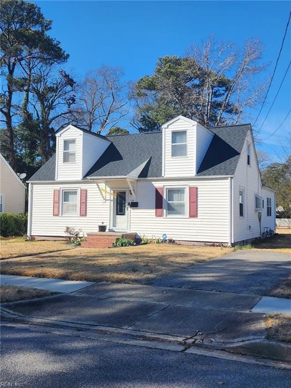 view of new england style home