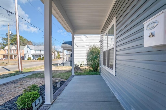 view of patio with a residential view