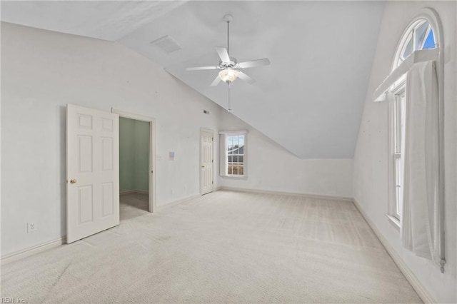 bonus room with baseboards, visible vents, lofted ceiling, ceiling fan, and carpet flooring