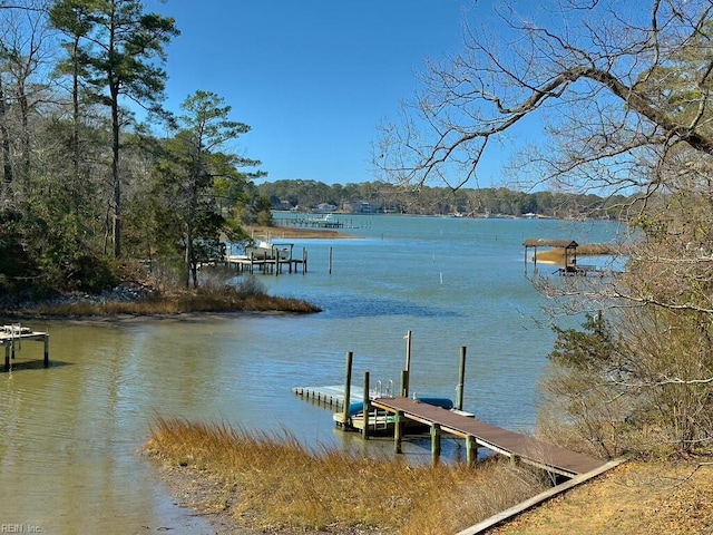 view of dock with a water view