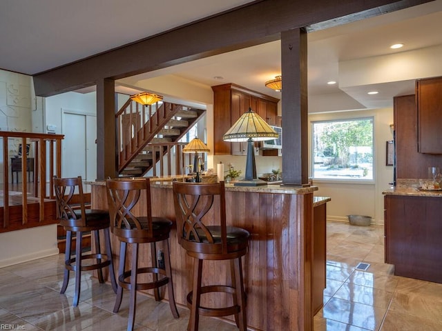 bar featuring stairs, baseboards, indoor bar, and recessed lighting