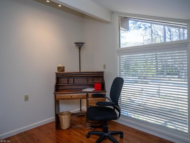 office area featuring baseboards and wood finished floors