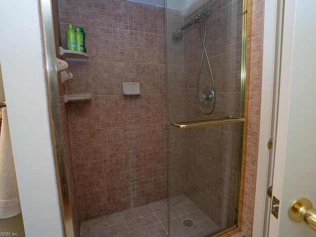 full bathroom featuring a stall shower