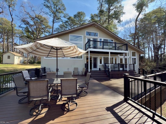 wooden deck with outdoor dining space