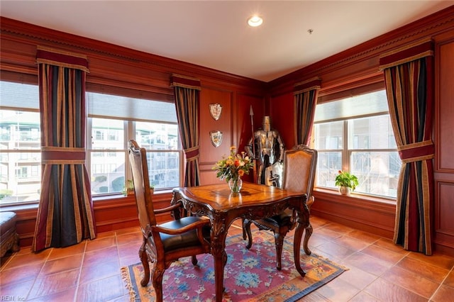 dining space with light tile patterned floors and a wealth of natural light