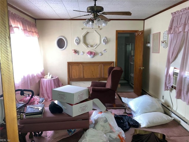 misc room featuring ceiling fan, a baseboard radiator, cooling unit, and crown molding