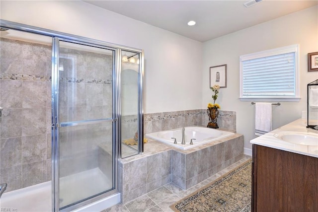 full bath with a garden tub, visible vents, a shower stall, vanity, and tile patterned floors