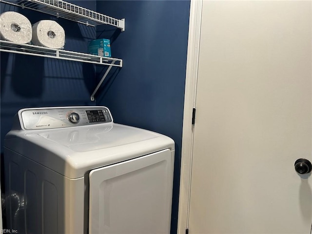 washroom featuring washer / dryer and laundry area