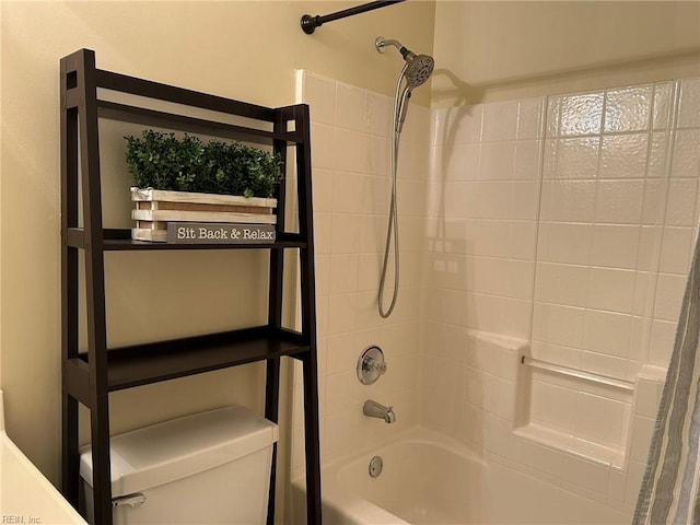 bathroom featuring toilet and shower / bathtub combination with curtain