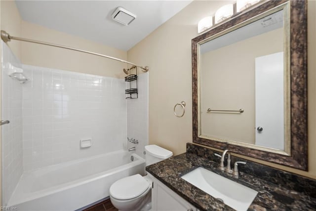 full bath featuring  shower combination, vanity, and toilet