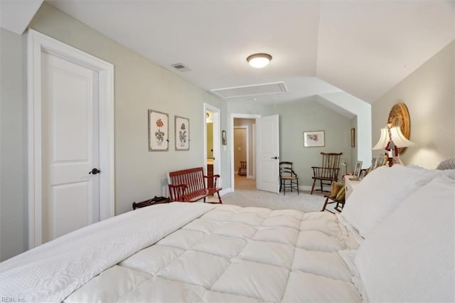 bedroom with carpet floors, visible vents, baseboards, vaulted ceiling, and attic access