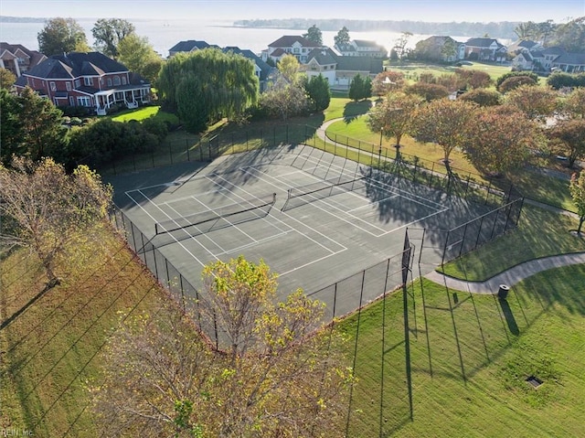 birds eye view of property with a residential view