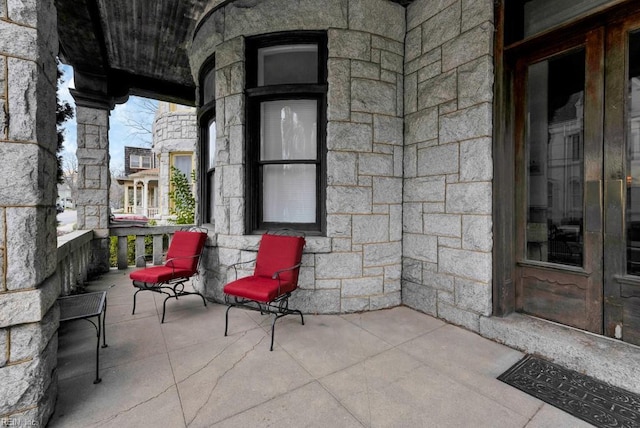 view of patio featuring a porch