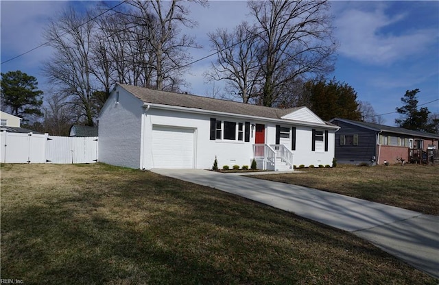 ranch-style home featuring an attached garage, brick siding, fence, a gate, and a front lawn