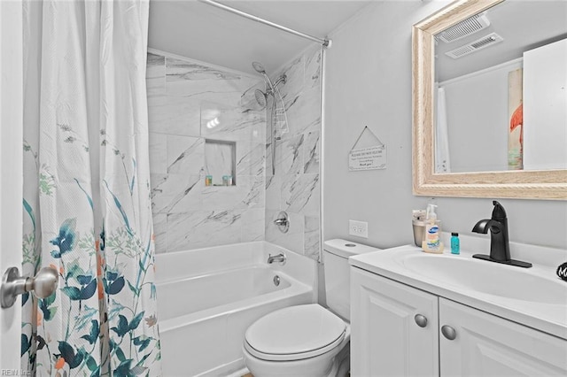 bathroom featuring shower / bath combo, visible vents, vanity, and toilet