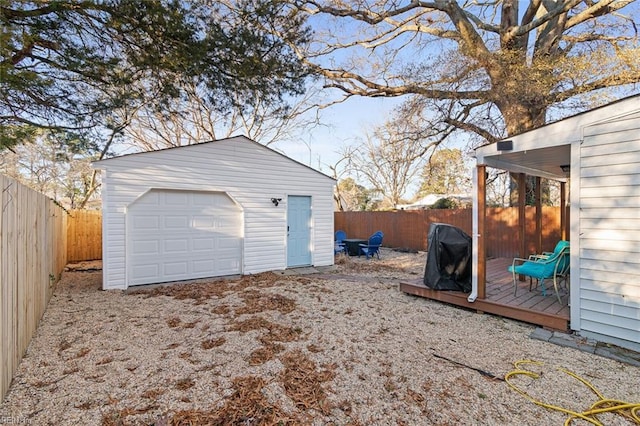 detached garage with fence