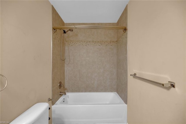 full bathroom with shower / bath combination and toilet