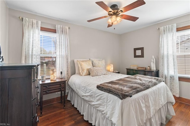 bedroom with hardwood / wood-style flooring and ceiling fan