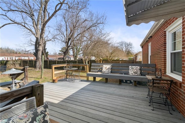 deck featuring a fenced backyard